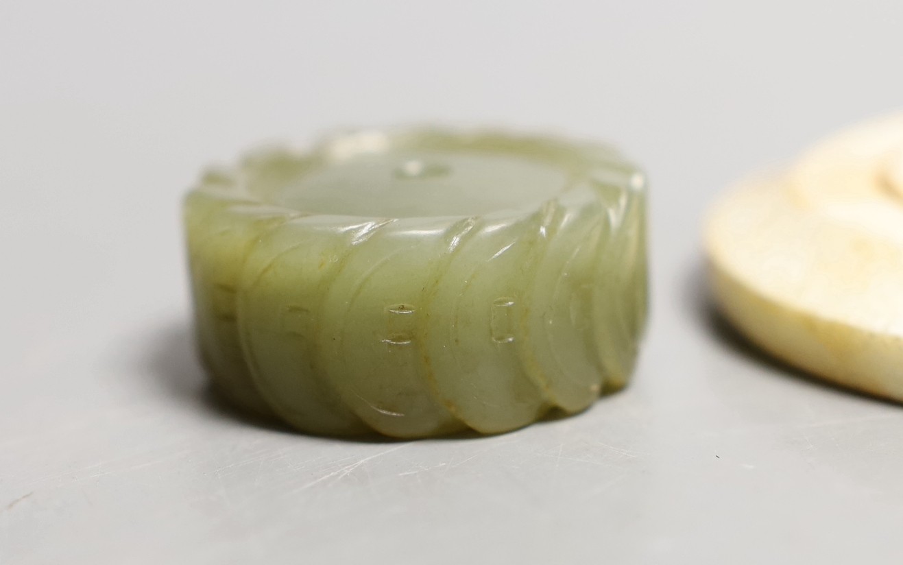 Three Chinese jade carvings - a huang, a disc and cash money